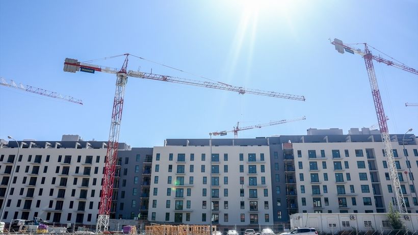 homes building with cranes