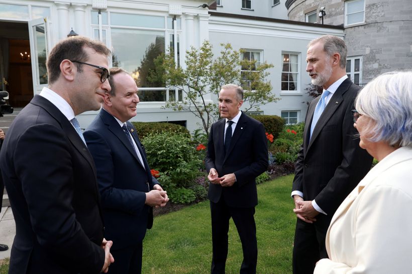 King Felipe VI talks with Mark Carney and Carlos Cuerpo