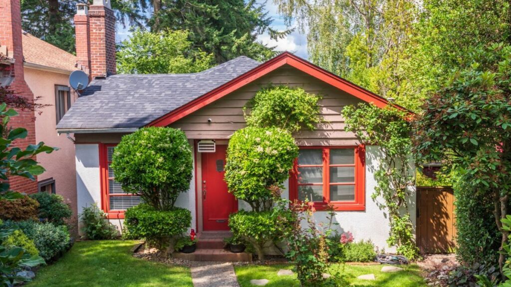 He builds a summer house in the garden and the City Council forces him to demolish it because it does not fit in with other homes in the neighborhood